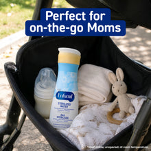 An Enfamil sterilized water bottle is shown inside a black stroller basket, alongside a baby bottle, folded cream cloth, and a small stuffed bunny, with a blue text overlay reading 'Perfect for on-the-go Moms'.