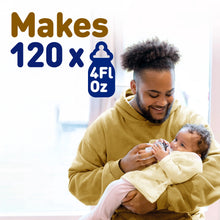 [44339001524405]Man holding a baby and a bottle with text indicating product capacity