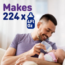 [42331205468341]Man feeding a baby with a bottle, with text indicating bottle capacity.