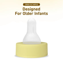 A baby bottle nipple with a translucent white cross-cut silicone top and a ribbed pale yellow base, shown on a white background with the text 'Designed For Older Infants' and 'CROSS-CUT NIPPLE' above it.